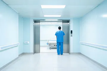 Hospital bed elevator corridor